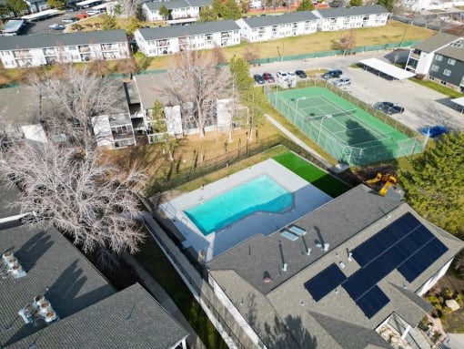 Aerial View of Pool and Tennis Court at Crossroads Apartments