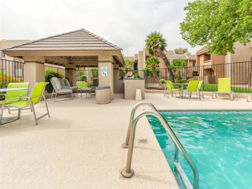 Lounging By The Pool at Cimarron Place Apartments, Arizona, 85712