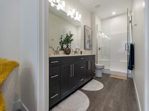 Bathroom with Walk In Shower at The Arza Apartments