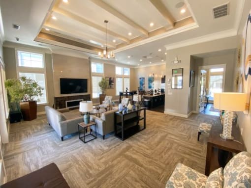 Clubroom With Smart TV And Ample Of Sitting Area at Talavera at the Junction Apartments & Townhomes, Midvale, Utah