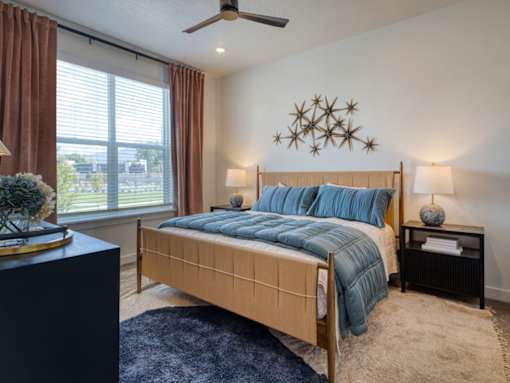 Bedroom with Ceiling Fan at Amara