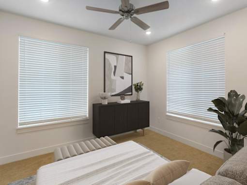 Bedroom with Ceiling Fan at Magnolia at Homestead staged