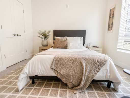 Bedroom with Large Closet at The Arza Apartments