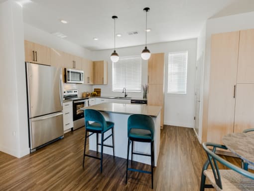 Open Kitchen with Island at Parc at Day Dairy Apartments and Townhomes, Draper, UT, 84020