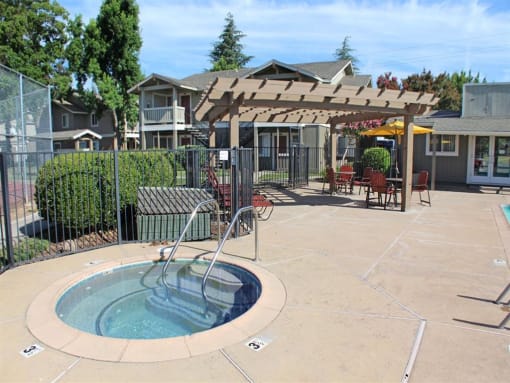 Outdoor Pool With Hot Tub Open Year-Round at Aspen Park Apartments, California