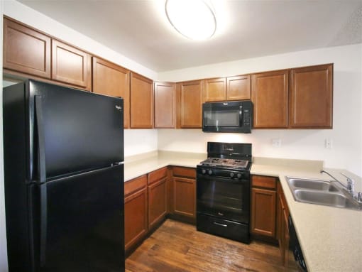 Modern Kitchen With Custom Cabinet at Creekside Villas Apartments, San Diego, 92102