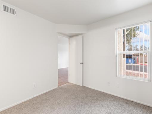 Carpeted Bedroom in Rio Seco Apartments