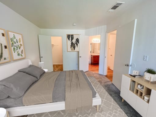 Comfy Bedroom at Chesapeake Commons Apartments