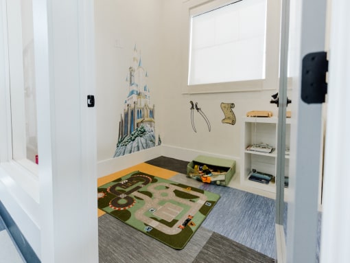 Playroom in Clubhouse at Parc at Day Dairy Apartments and Townhomes, Draper, UT, 84020