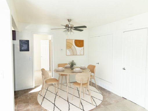 Dining Area with Ceiling Fan at Crossroads Apartments