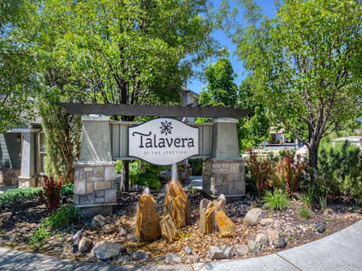 A sign that says Talavera at the junction.
