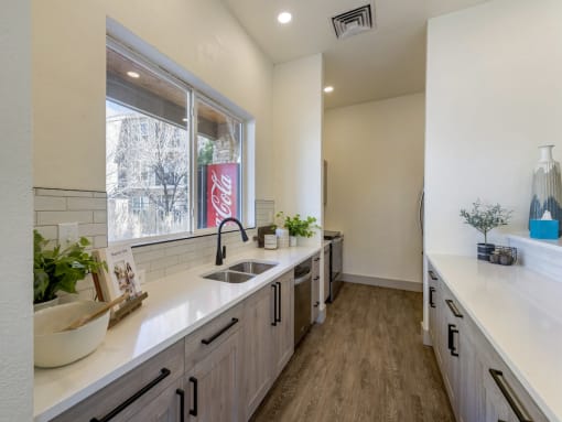 Kitchen Equipped with Modern Appliances at the Clubhouse at Trailside