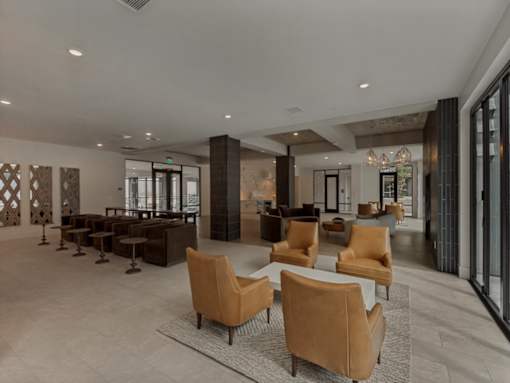 A spacious living room with a large sofa set and a coffee table.