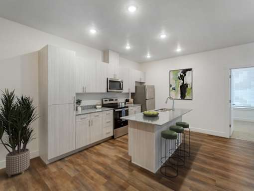 Kitchen with Island at Magnolia at Homestead