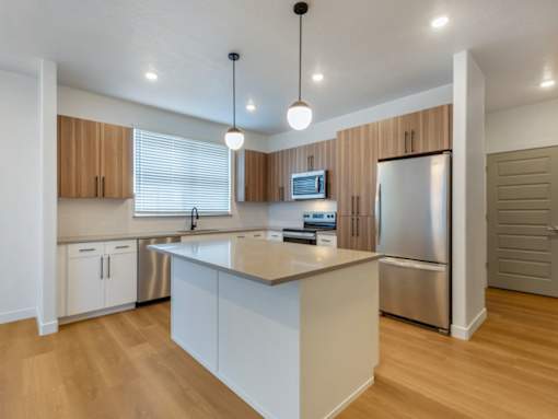 Kitchen with Silver Appliances at Amara Apartments,Midvale,84047