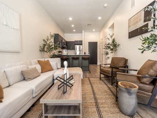 Living Room and Kitchen at The Arza Apartments