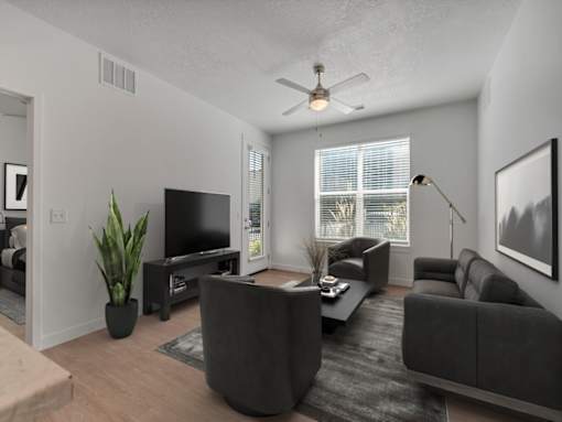 Living Room with Couch and Chairs at Garden Lofts