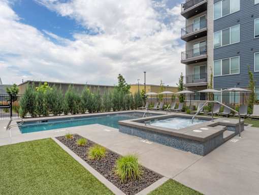 Lounge Chairs by Pool at City Lofts Apartments