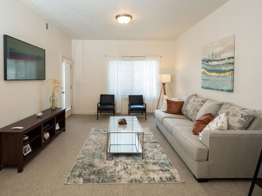 Classic Living Room Design With Television at Four Seasons at Southtowne Apartments, South Jordan, 84095