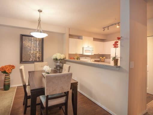 Dining Area And Open Kitchen at Metropolitan Collection Apartments, Renton, Washington