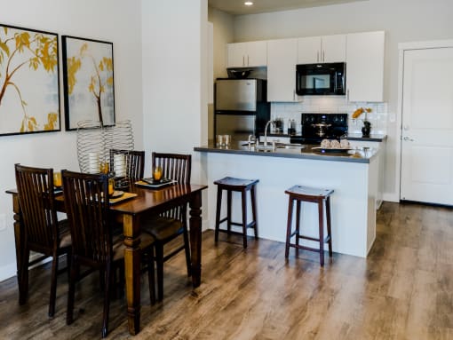 Open Concept Kitchen with Light Cabinetry at Parc at Day Dairy Apartments and Townhomes, Draper, 84020
