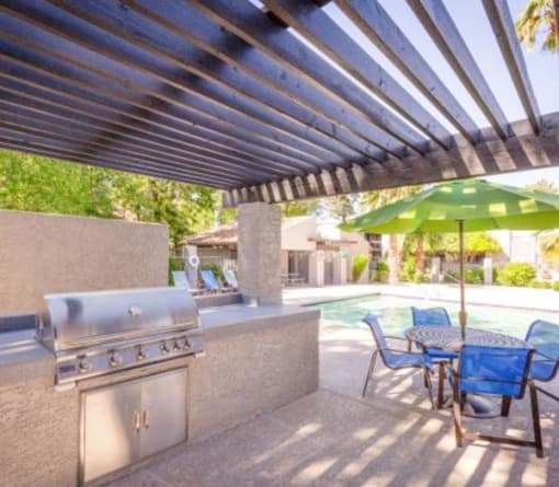 Gathering Area With Grills And Corn Hole at Aztec Springs Apartments, Mesa, 85207