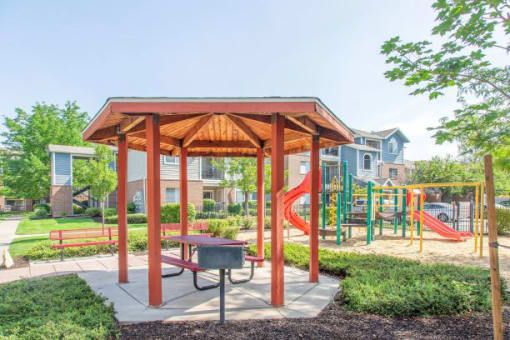 Courtyard with Picnic Area & Playground  at Remington Apartments, Midvale, UT, 84047