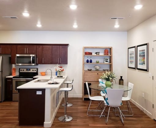 Dining Room with Kitchen at Four Seasons Apartments & Townhomes, Utah