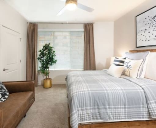 Bedroom With Expansive Windows at Rivulet Apartments, American Fork, Utah