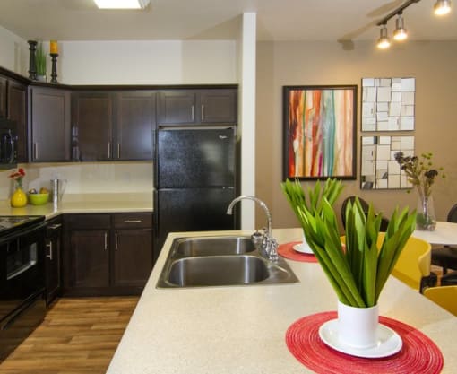 Granite Countertop Kitchen Island at Talavera at the Junction Apartments & Townhomes, Midvale, UT, 84047