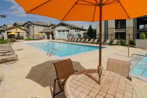 Poolside Dining Tables at Talavera at the Junction Apartments & Townhomes, Midvale, UT, 84047