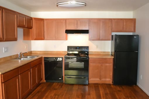 Fully Equipped Kitchen at Village Grove Apartments, Escondido, CA