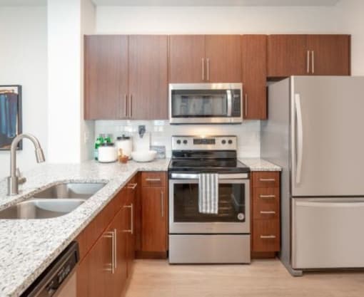 Gourmet Kitchen with Granite Countertops & Stainless Steel Appliances