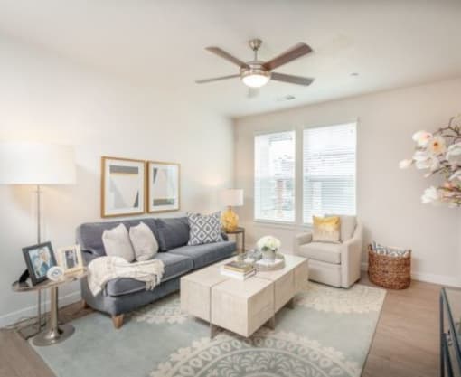 Large Living Area with Ceiling Fan at Parc on 5th Apartments and Townhomes