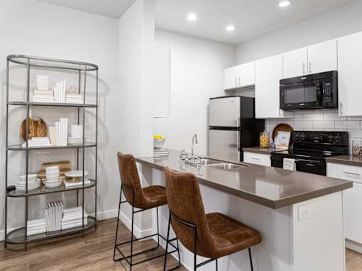 Kitchen with Island in Phase I TH at Parc at Day Dairy