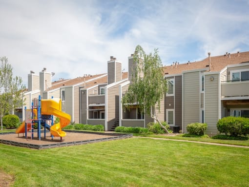 Outdoor Space with Playground at Chesapeake Commons Apartments, Rancho Cordova