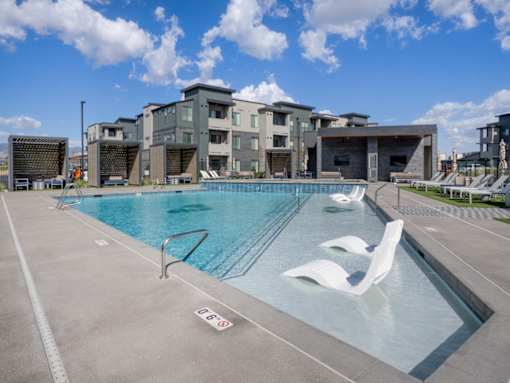 Pool with Chairs at Amara