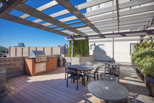 BBQ Grilling Station and Lounge Area  at Revo 225 Apartments, Renton, WA, 98057