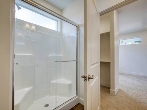 Shower with Sliding Glass Door at The Atlas