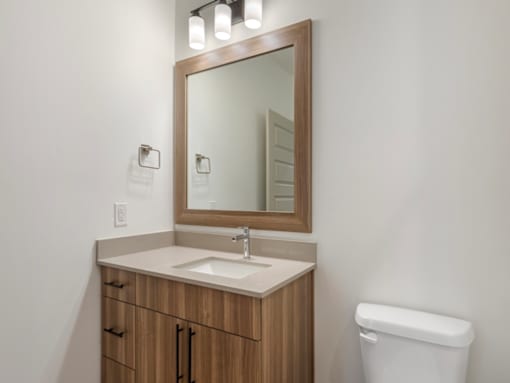 Sink and Mirror in Bathroom at Amara Apartments,Midvale