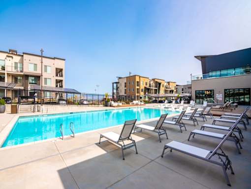 Outdoor pool and spa at Soleil Lofts
