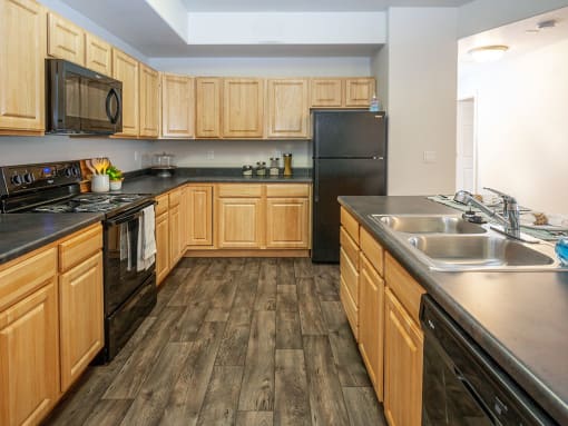 Spacious Kitchen With Pantry Cabinet at Four Seasons at Southtowne Apartments, South Jordan, UT