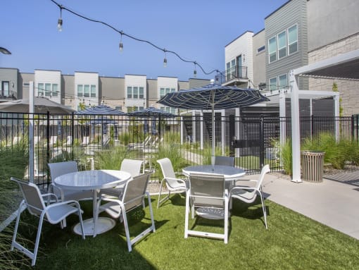 Tables by Pool at The Austin Townhomes