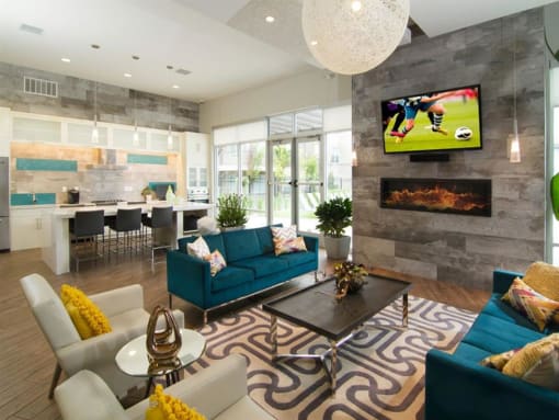 Large Clubhouse With Ample Sitting And Television at Lofts at 7800 Apartments, Midvale, UT
