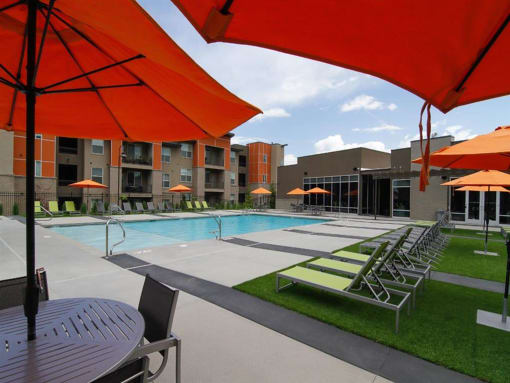 Swimming Pool Area With Shaded Chairs at Lofts at 7800 Apartments, Midvale, UT