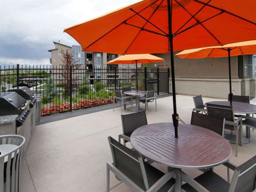 Courtyard Sitting With Umbrella Shades at Lofts at 7800 Apartments, Utah