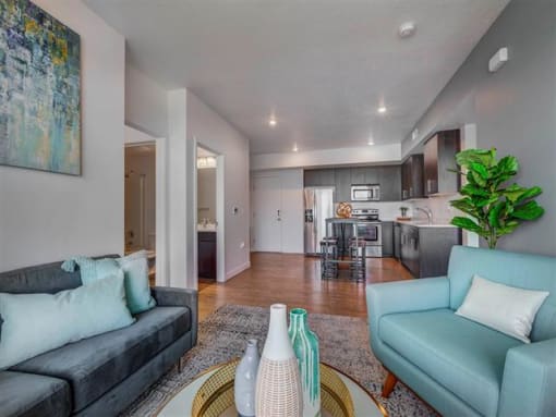 Warm And Inviting Living Room with Kitchen view at Element 31 Apartments, Salt Lake City, UT, 84106