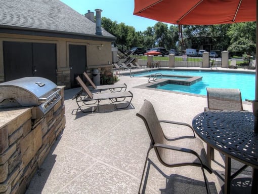 Poolside Sundeck And Grilling Area at Promontory Point Apartments, Sandy, Utah