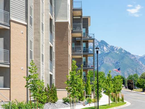 View of Arcadia Apartments in Front of Mountains