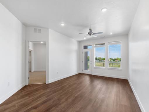 The Grove at Orchard Park Living Room and Door to Bedroom